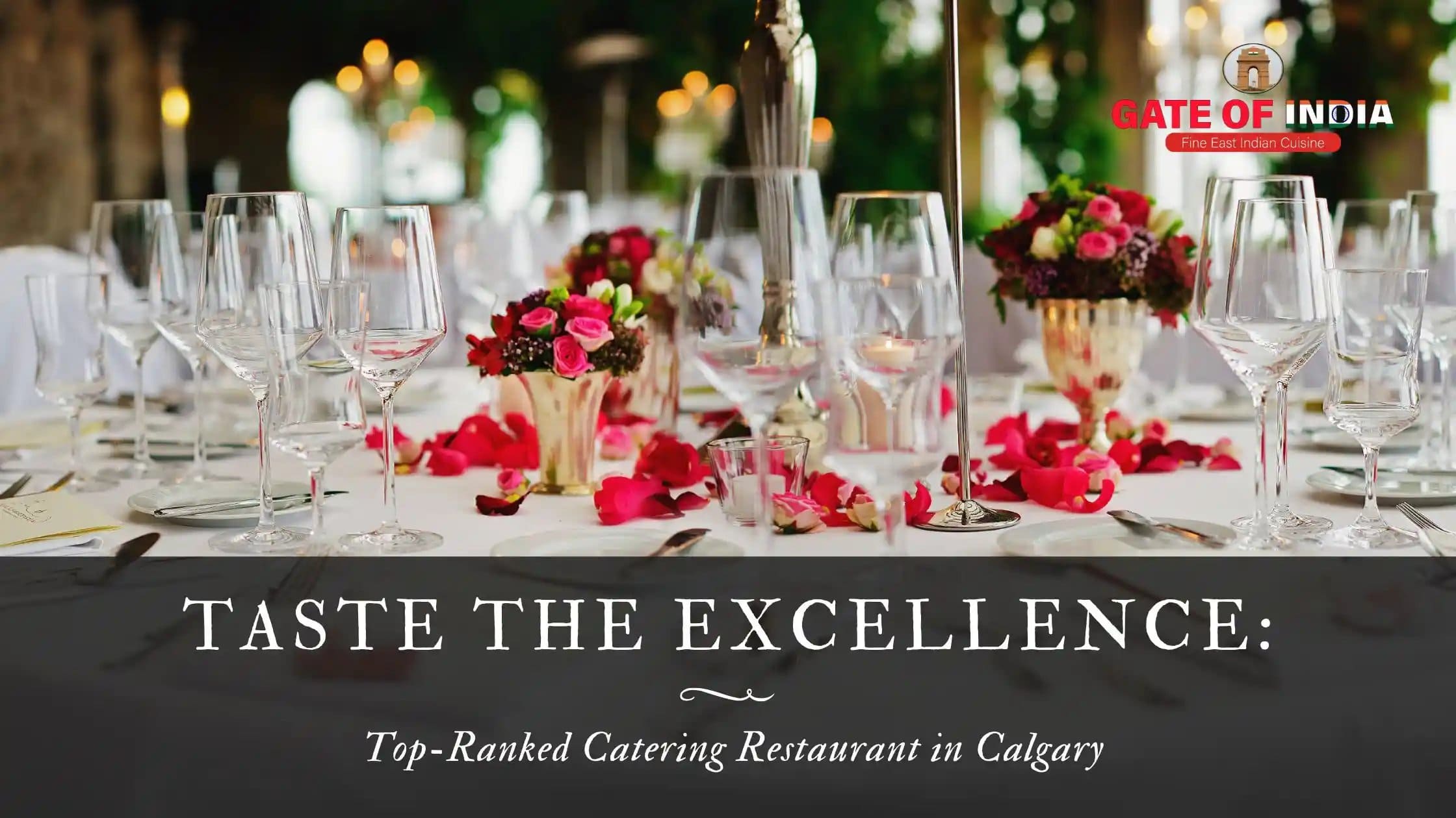 Elegant catering table with wine glasses and flowers at Gate of India Calgary restaurant event